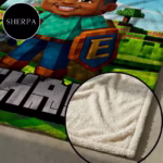 Close-up of a personalized kids' blanket highlighting the thick, white Sherpa fleece lining, known for its cozy and wool-like texture.