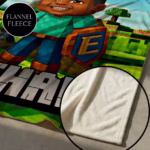 Close-up of a custom personalized kids' flannel fleece blanket featuring an 8-bit gamer character design, with a magnified inset highlighting the soft, white plush fleece texture on the reverse side.