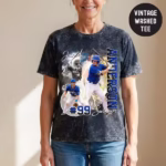 Woman modeling a personalized vintage washed baseball tee featuring a custom photo collage of player Jared Anderson, number 99, for the Swingers team.